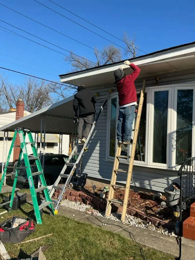 Restoration crew performing exterior repair in Madison
